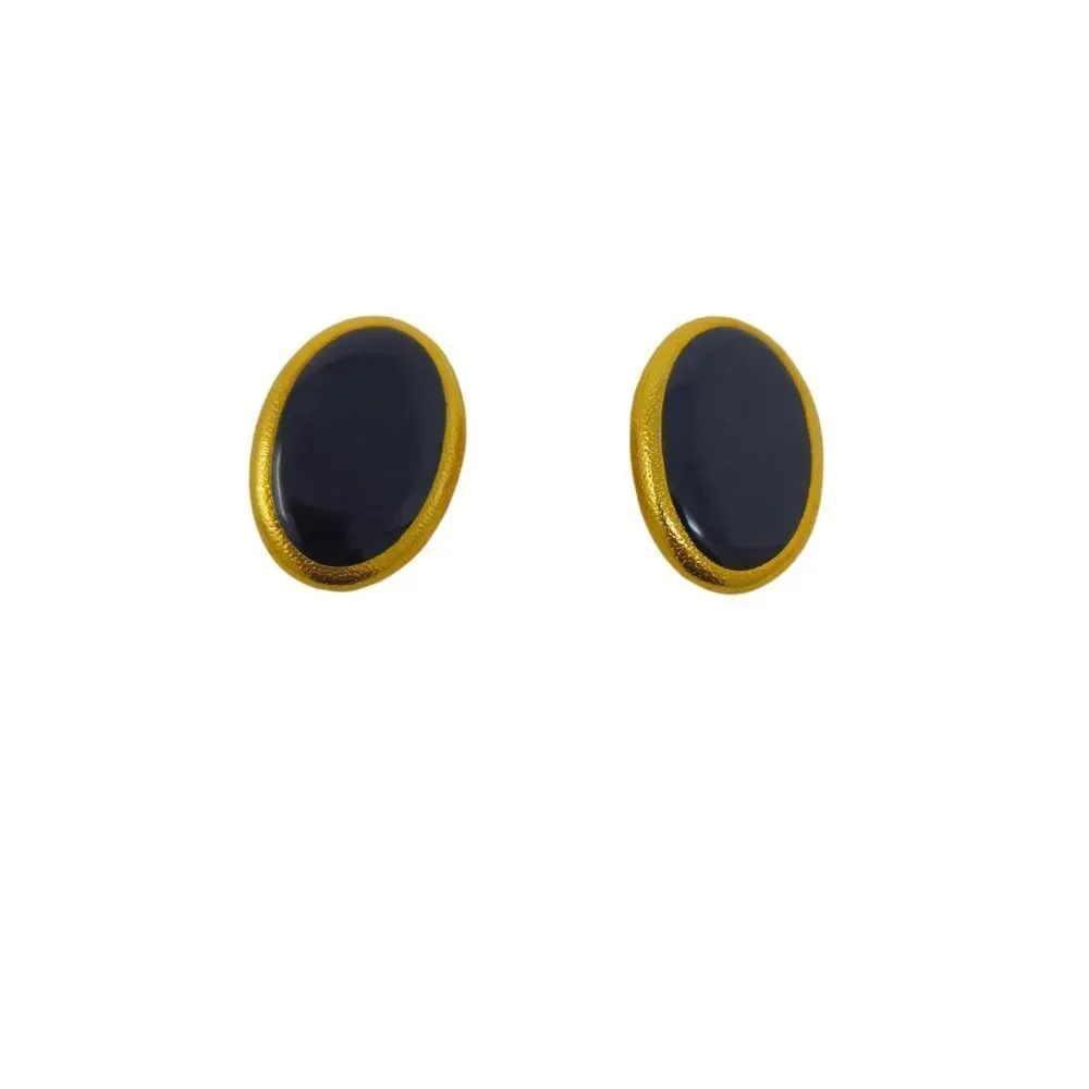 Vintage Anne Klein clip-on earrings featuring glossy black enamel ovals